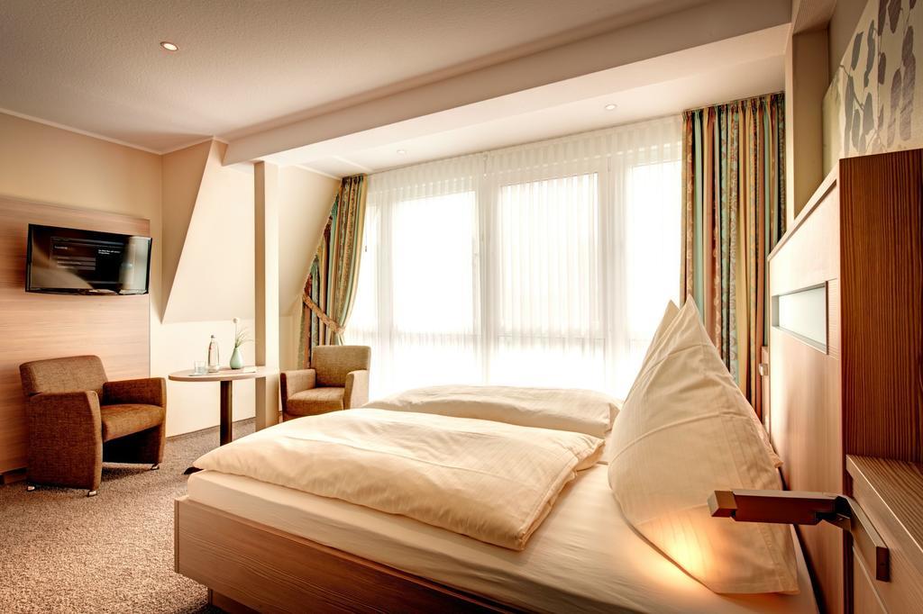 Hotel Muschelgrund Куксхавен Стая снимка